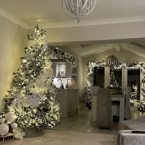 A photograph of our of our Influencers Homes filled with our Christmas Tree and Decorations.